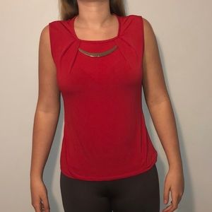 red sleeveless shirt. with connected necklace